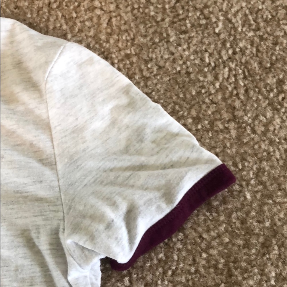 Tee with garnet collar and sleeve detailing. - Picture 2 of 5